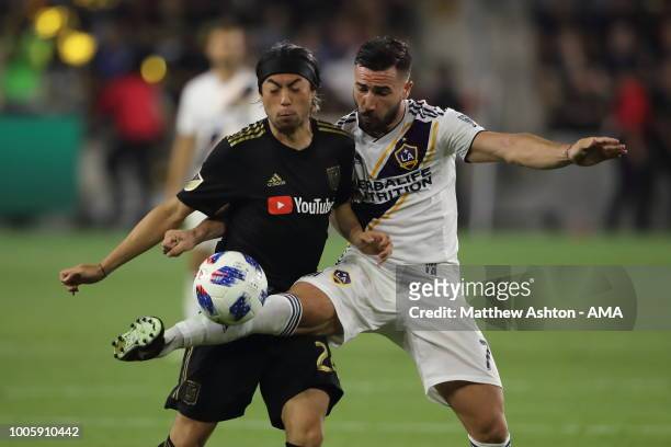 Lee Nguyen of LAFC Los Angeles Football Club and Romain Alessandrini of LA Galaxy during the MLS match between LAFC and LA Galaxy at Banc of...