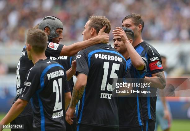 Phillip Tietz of Paderborn celebrates after scoring his team`s second goal with team mates during the Friendly match between SC Paderborn 07 and AS...