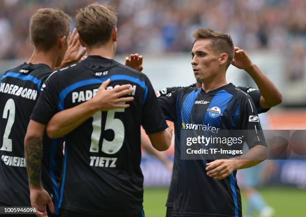 Phillip Tietz of Paderborn celebrates after scoring his team`s second goal with Philipp Klement of Paderborn during the Friendly match between SC...