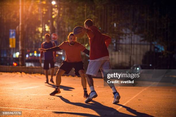 they know to play streetball - basketball court stock pictures, royalty-free photos & images