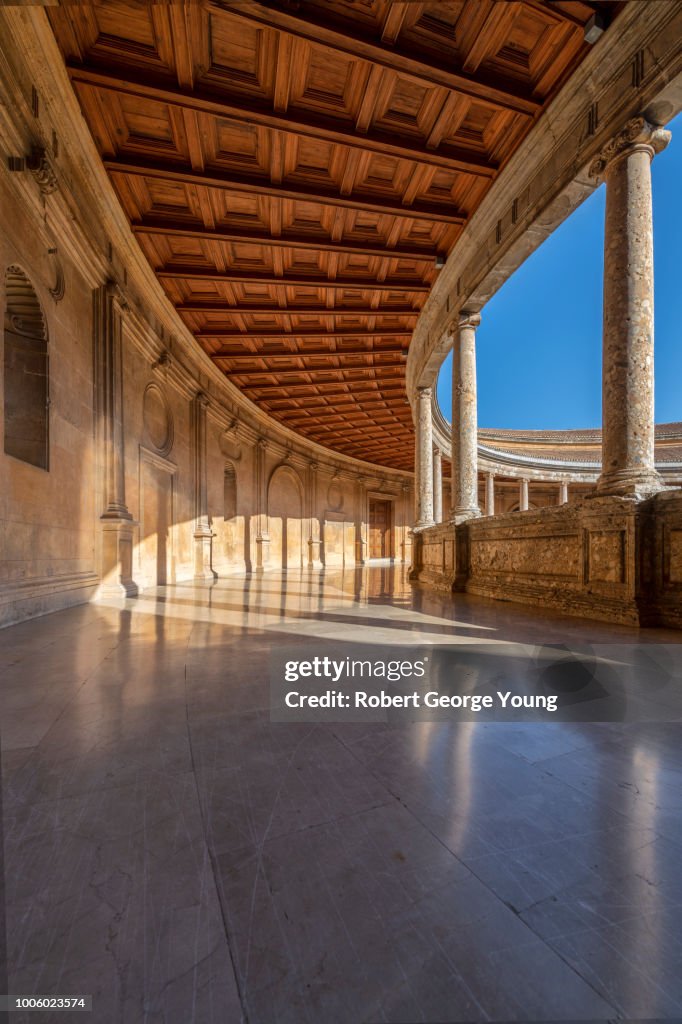 2nd story walkway or gallery around the circular courtyard of Charles V (Palacio de Carlos V), Alhambra, a Moorish fortress complex in Granada, Andalusia, Spain