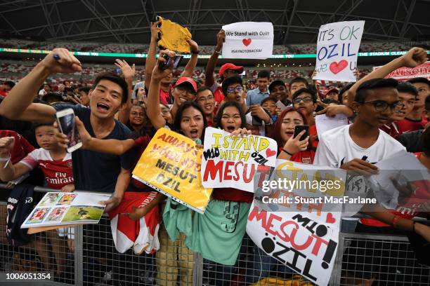 Arsenal fans during a training session at the Singapore National Stadium on July 27, 2018 in Singapore.