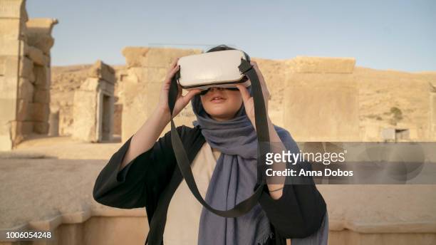 Medium of Woman uses a VR device in Persepolis
