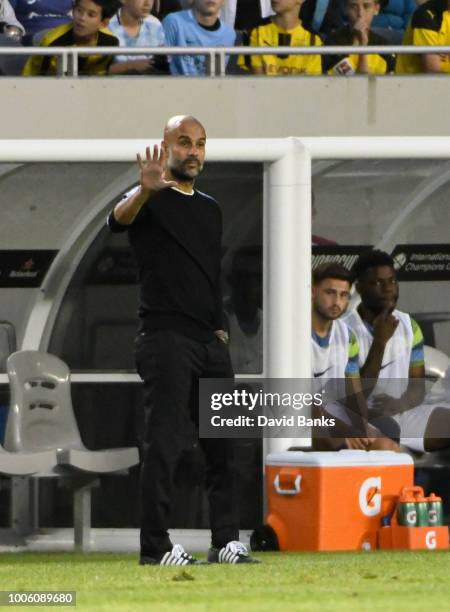 Manchester City head coach Pep Guardiola coaches against Borussia Dortmund on July 20, 2018 at Soldier Field in Chicago, Illinois.