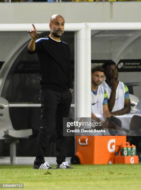 Manchester City head coach Pep Guardiola coaches against Borussia Dortmund on July 20, 2018 at Soldier Field in Chicago, Illinois.