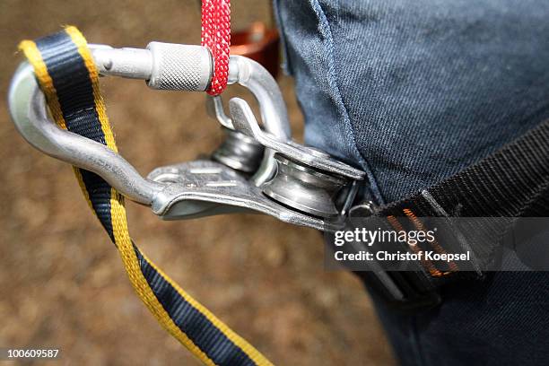 Locking snap hook is seen during a climbing session at the GHW tightrobe climbing garden on May 25, 2010 in Hueckeswagen, Germany.