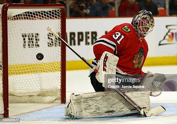 Goaltender Antti Niemi of the Chicago Blackhawks makes a save while taking on the San Jose Sharks in Game Four of the Western Conference Finals...