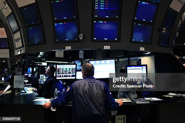 Traders work on the floor of the New York Stock Exchange on May 25, 2010 in New York City. After significant morning losses, the Dow Jones industrial...