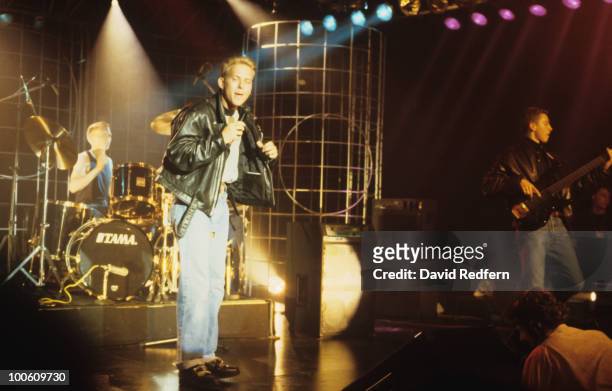 Luke Goss, Matt Goss and Craig Logan of Bros perform on stage circa 1988.
