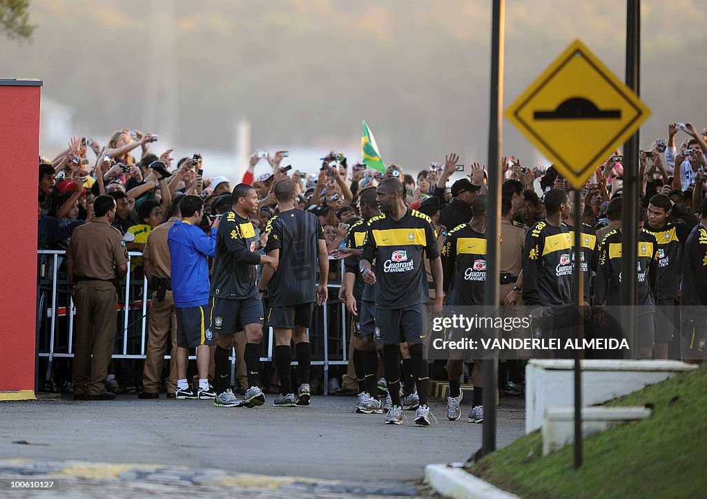 Brazilian players celebrate with fans du