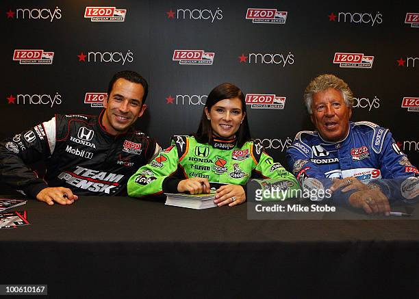 Indy 500 drivers Helio Castroneves, Danica Patrick and Mario Andretti pose for a photo at Macy's and IZOD's celebration of the Indianapolis Motor...