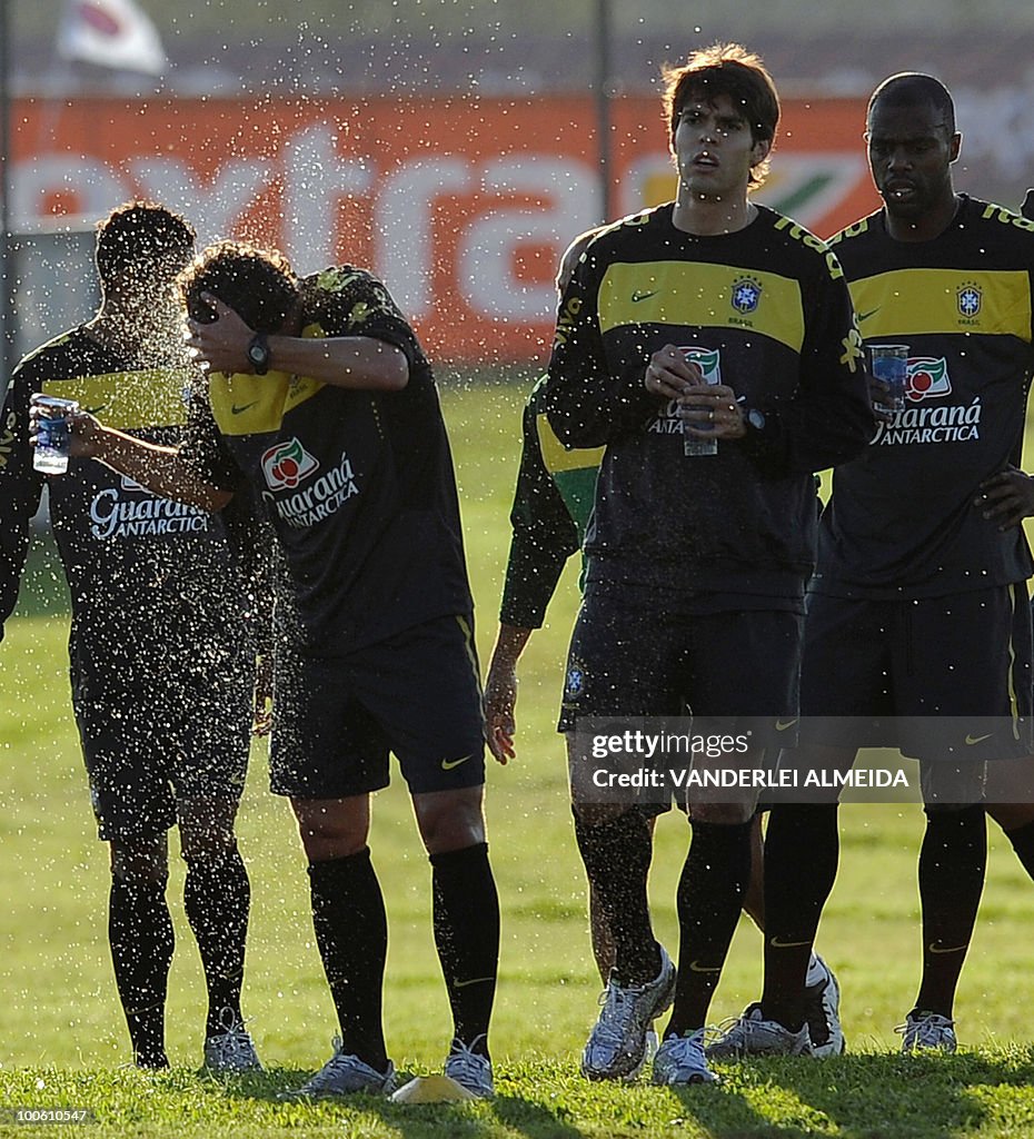 Brazilian players Elano, Kaka, and Grafi