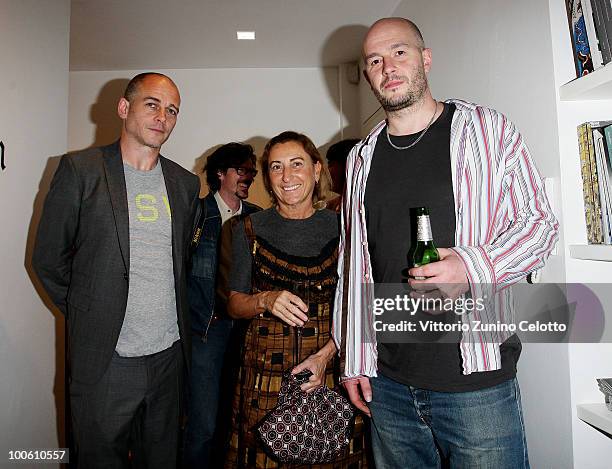 Dinos Chapman, Miuccia Prada, Jake Chapman attend the Jake And Dinos Chapman Opening At The ProjectB Gallery on May 25, 2010 in Milan, Italy.