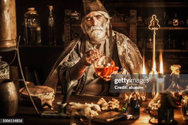 the alchemist - potion stock pictures, royalty-free photos & images