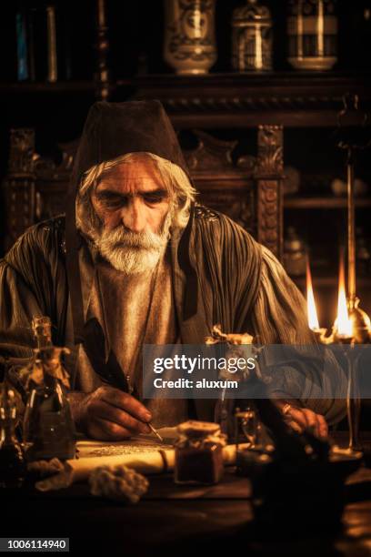 the alchemist - ancient writing stock pictures, royalty-free photos & images