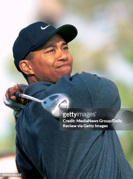 Photo by ron lewis/staff 2/3/00 hayward daily review&#13;&#13;Tiger Woods watches his 4th hole drive at Poppy Hills during Thursday's first round of...