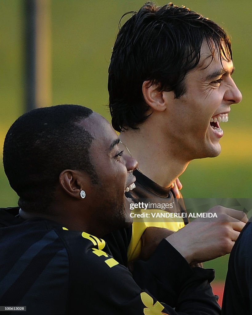 Brazilian players Kaka (R) and Robinho l