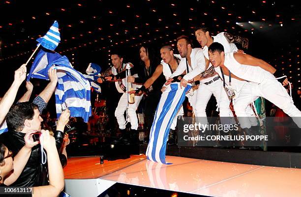 Giorgos Alkaios & Friends from Greece celebrate after qualifying for the final Eurovision Song Contest in Telenor Arena in Baerum, Norway, on May 25,...