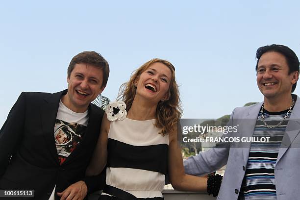 Russian actor Artem Menshikov, Russian actress Nadezhda Mihalkova and Russian actor Oleg Menshikov pose during the photocall of "Utomlyonnye Solntsem...