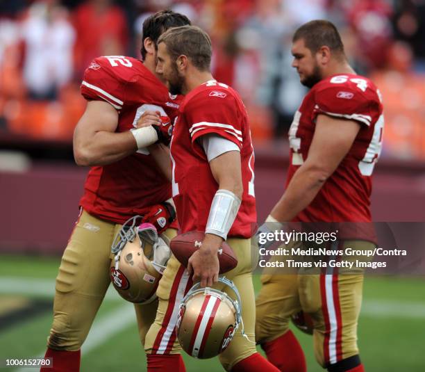 San Francisco 49ers quarterback Alex Smith is congratulated by his teammate Nate Byham after defeating the Oakland Raiders on Sunday, Oct. 17 at...