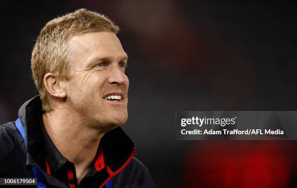 Former Bombers player Dustin Fletcher chats to fans during the 2018 AFL round 19 match between the Essendon Bombers and the Sydney Swans at Etihad...