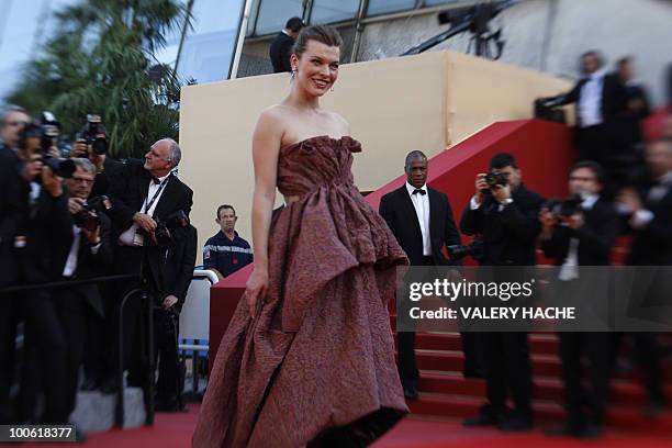 Model Milla Jovovich arrives for the screening of "Utomlyonnye Solntsem 2: Predstoyanie" presented in competition at the 63rd Cannes Film Festival on...