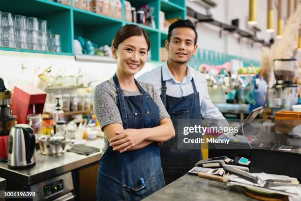 coffee shop owner couple small business malaysia - coffee shop couple stock pictures, royalty-free photos & images