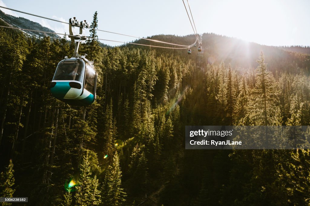 Gondola Lift Going Up Mountain in Banff Canada