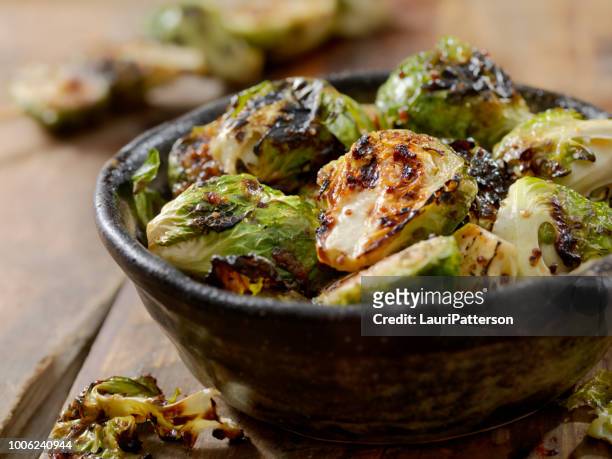 bbq brussels sprouts with grainy mustard, honey glaze - side dish stock pictures, royalty-free photos & images