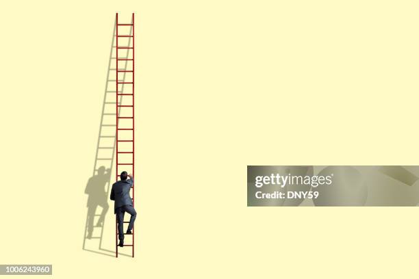 businessman climbing ladder - tall stock pictures, royalty-free photos & images