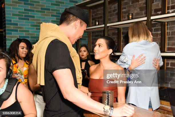 Patrick Ta and Kourtney Kardashian attend White Fox Boutique Swimwear Launch Of 100% Salty at Catch on July 26, 2018 in West Hollywood, California.