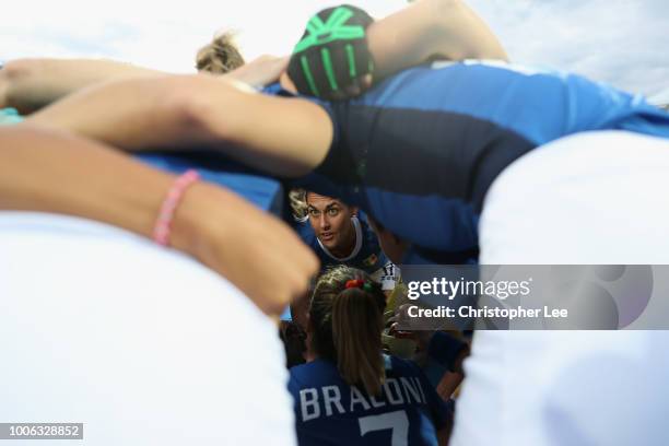 Chiara Tiddi of Italy talks to her team in the huddle before kick off during the Pool A game between South Korea and Italy of the FIH Womens Hockey...