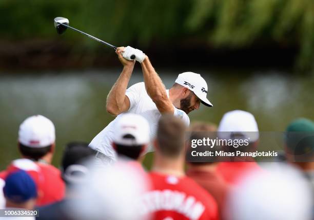 Dustin Johnson plays his shot from the eighth tee during the second round at the RBC Canadian Open at Glen Abbey Golf Club on July 27, 2018 in...