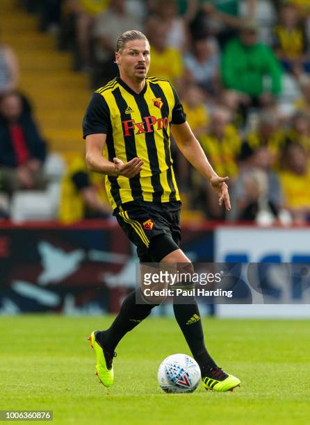 Sebastian Prodl of Watford FC drives the ball during the pre-season friendly match between Stevenage and Watford at The Lamex Stadium on July 27,...