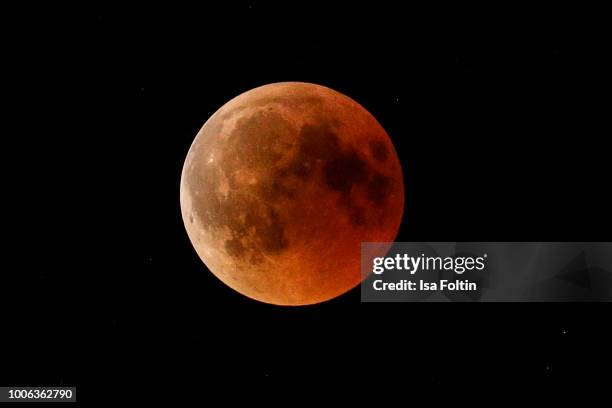 The moon over Regensburg during the total lunar eclipse on July 27, 2018 in Regensburg, Germany.