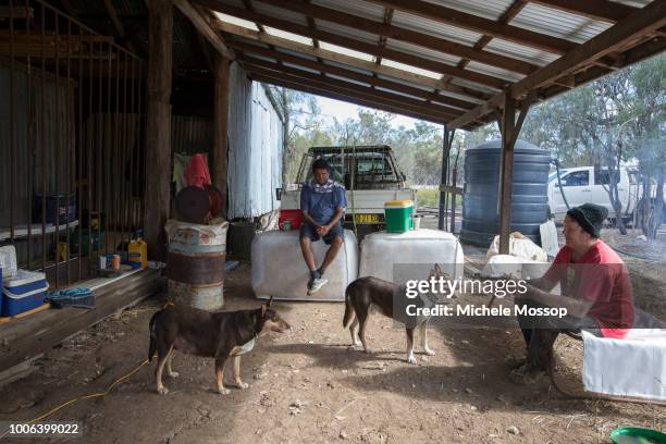 John Johnson and Dan Anderson during "Smoko" or tea break with is a tradition in Australian shearing sheds on July 6, 2018 in Moree, Australia. Penny...