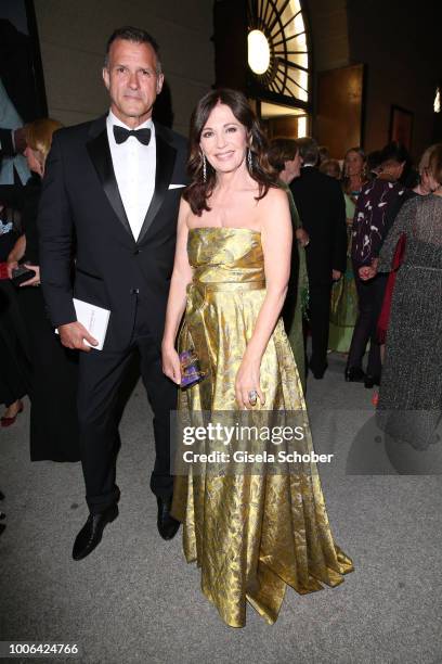 Iris Berben and her boyfriend Heiko Kiesow during the premiere of 'Die Zauberfloete' during the Salzburg Festival 2018 at Salzburg State Theatre on...