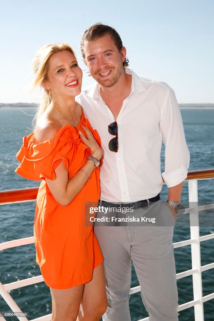 Laura Karasek Briggs and her husband Dominic Briggs are seen on the