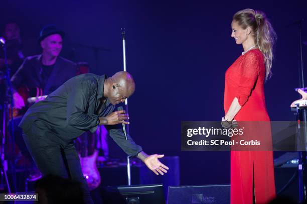Seal and Adriana Karembeu on stage during the 70th Monaco Red Cross Ball Gala on July 27, 2018 in Monte-Carlo, Monaco.