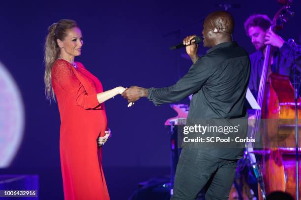 Seal and Adriana Karembeu on stage during the 70th Monaco Red Cross Ball Gala on July 27, 2018 in Monte-Carlo, Monaco.