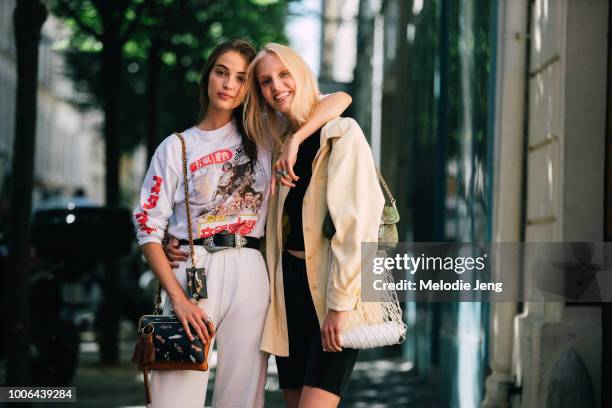 Models Camille Hurel, Jessie Bloemendaal after the Sacai show during Paris Fashion Week Mens Spring/Summer 2019 on June 23, 2018 in Paris, France....