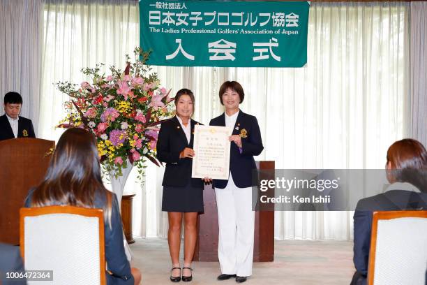 Sayaka Takahashi of Japan holds the certification during Japanese LPGA New Professional Golfers Welcome Ceremony at Cherry Hills Golf Club on July...