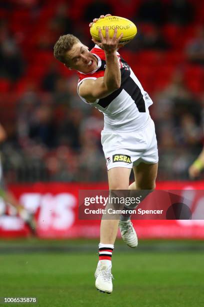 Jack Lonie of the Saints marks during the round 19 AFL match between the Greater Western Sydney Giants and the St Kilda Saints at Spotless Stadium on...