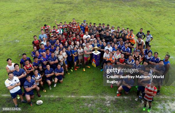 Players pose with the Webb Ellis Cup at the launch of a local rugby sevens festival during day 2 of the Rugby World Cup 2019 Trophy Tour on July 28,...