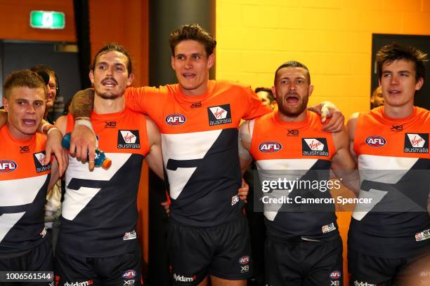 Giants players sing their team song after winning the round 19 AFL match between the Greater Western Sydney Giants and the St Kilda Saints at...