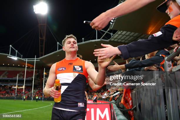 Jacob Hopper of the Giants thanks fans after winning the round 19 AFL match between the Greater Western Sydney Giants and the St Kilda Saints at...