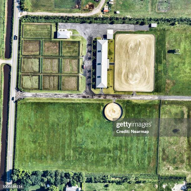 aerial view of horse training farm. florida, usa - aerial barn stock pictures, royalty-free photos & images