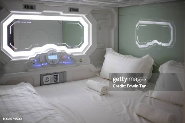 capsule hotel room interior - capsule hotel stock pictures, royalty-free photos & images