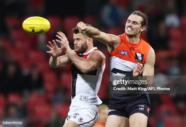 Maverick Weller of the Saints competes for the ball against Phil Davis of the Giants during the round 19 AFL match between the Greater Western Sydney...