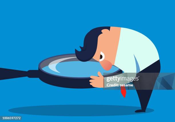 businessman observes through a magnifying glass - person looking through magnifying glass stock illustrations